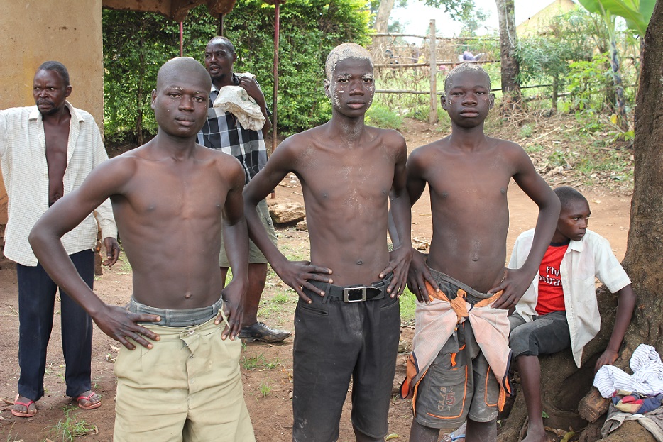 Khabeli Gidudu and Watuwa at the home of a Mutoto elder on the second day of the Imbalu smearing rite