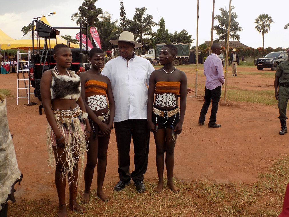 President Museveni with some of the girls who stood out in the best traditionally dressed female contest 2