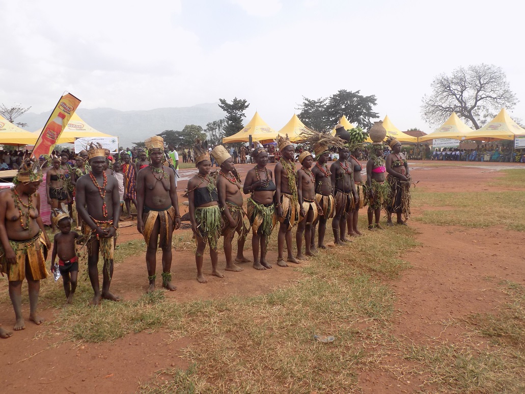 Singers and dancers from the Lucheke clan queue up to showcase antique Gisu traditional wear at the Parade 2