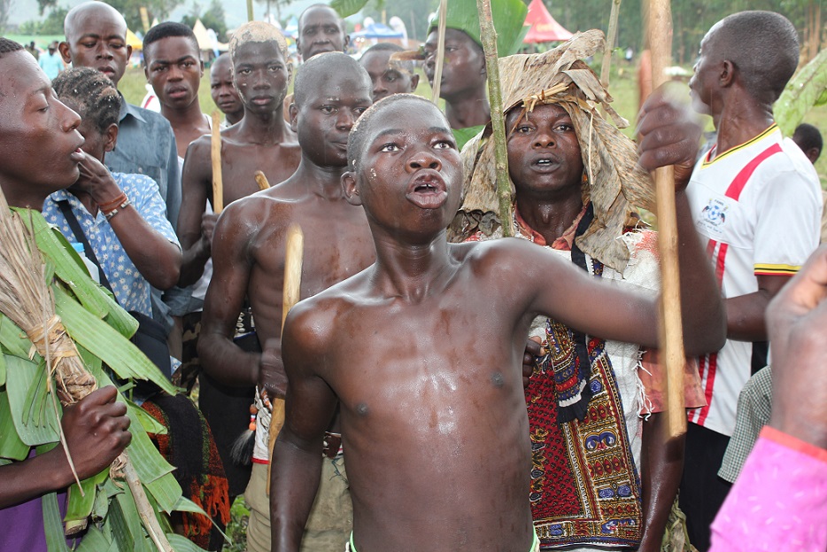 Watuwa Khabeli and Gidudu arrive at the Mutoto ground for the second day of the millet yeast smearing rite