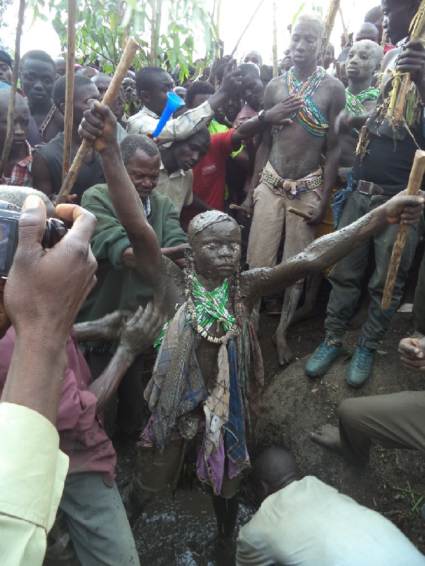 One-of-the-candidates-being-smeared-with-the-black-swamp-mud-the-last-stage-before-an-Imbalu-candidate-faces-the-cut._20201028-111304_1